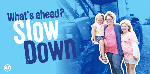 Pukekohe billboard showing mother and two kids urging people to slow down