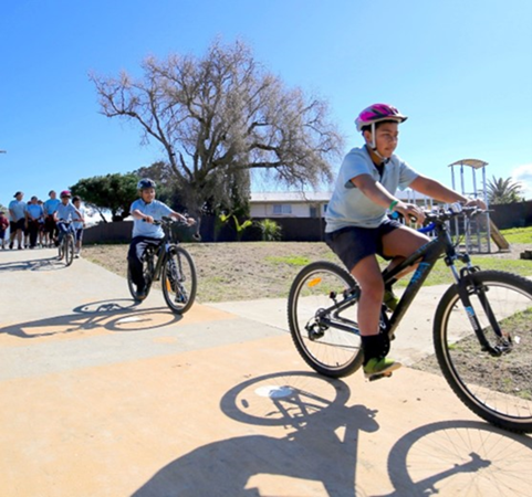 Children cycling on a nice day